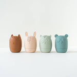 Colored Organics Animal Bath Toys, four silicone squirt toys shaped like a cat, bunny, owl and bear in terracotta, blush, sage and teal