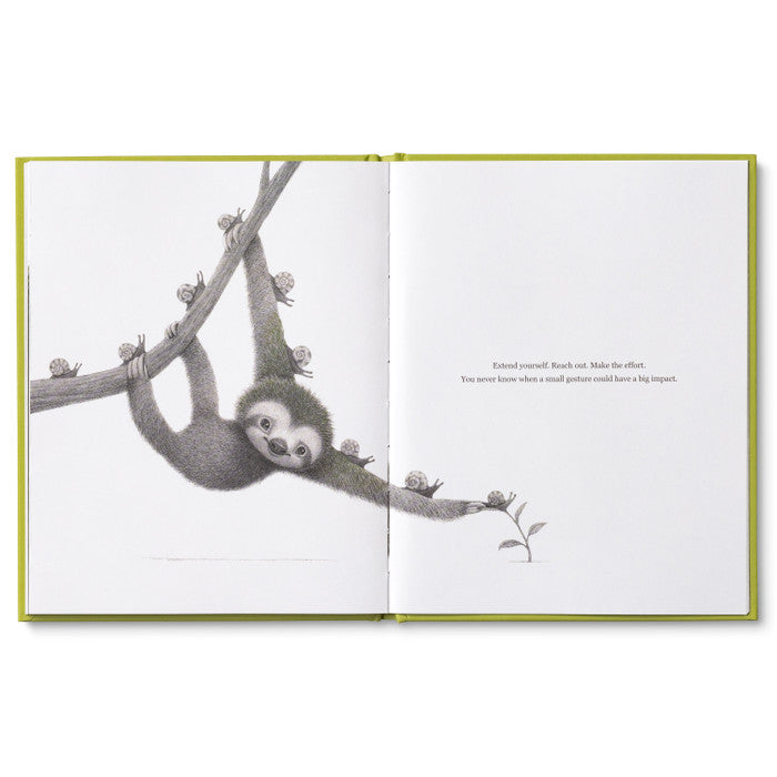 Compendium Being Kind book open to a page of a sloth hanging from a branch holding a flower