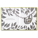 Compendium Being Kind book open to an illustration of a sloth resting among gray leaves
