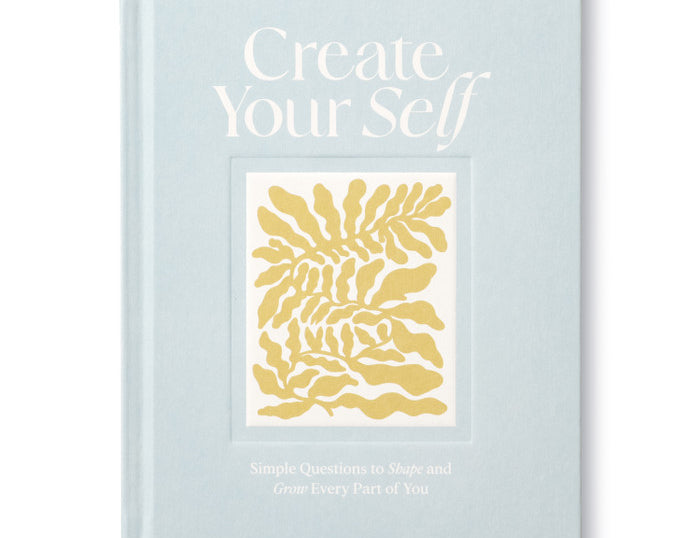 Compendium Create Your Self Guided Journal, a light blue cover with a yellow leaf illustration