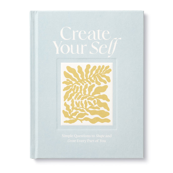 Compendium Create Your Self Guided Journal, a light blue cover with a yellow leaf illustration