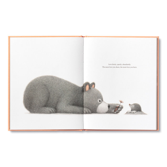 Compendium Feeling Grateful book open to a bear lying down face to face with a small mouse