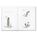Compendium Maybe Deluxe Book open to a child drawing and playing across two pages