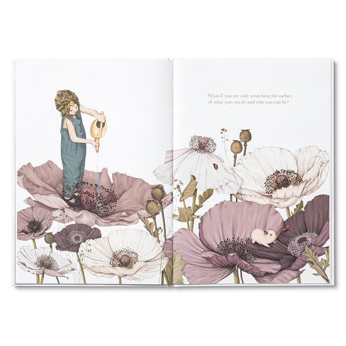 Compendium Maybe Deluxe Book open to a child among giant mauve poppies