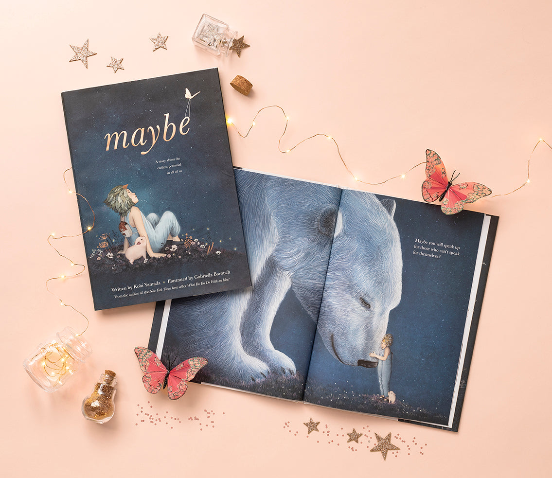 Compendium Maybe Deluxe Book open beside a closed copy with fairy lights, stars and butterflies