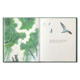 Compendium Noticing book open to a watercolor of birds flying over treetops