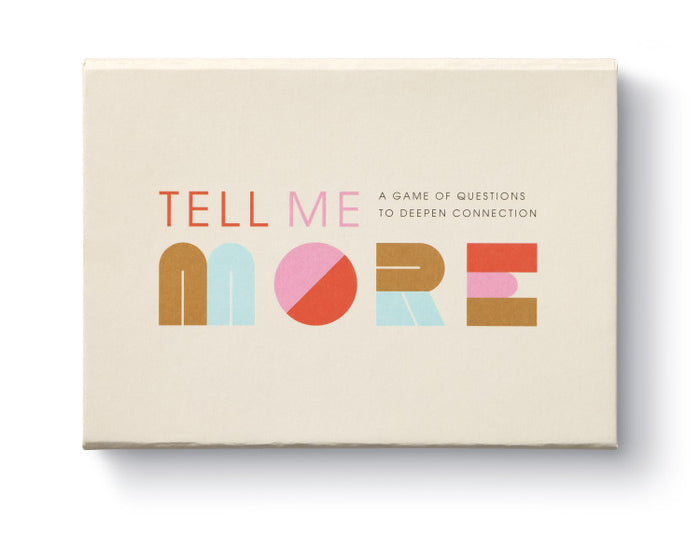 Compendium Tell Me More Game, a cream box with colorful lettering, a game of questions to deepen connection