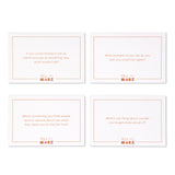 Four Compendium Tell Me More Game question cards laid out on white