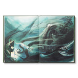 Compendium The Storyteller's Almanac open to a watercolor of an underwater sea creature scene