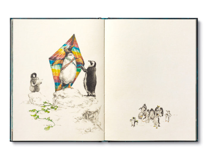 Compendium The Storyteller's Handbook open to a watercolor of penguins flying a colorful kite