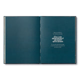 Compendium The Storyteller's Handbook open to the navy title page reading You can bend reality and paint with stars