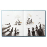 Compendium Trying book open to an illustration of animals gathered watching a child at work