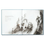 Compendium Trying book open to an illustration of a lion emerging from a dark storm