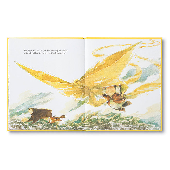 Compendium What Do You Do With a Chance book open to a child running toward a giant golden bird