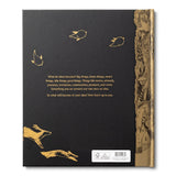 What Do You Do With an Idea? 10th Anniversary Edition by Compendium, black back cover with gold foil birds and summary text