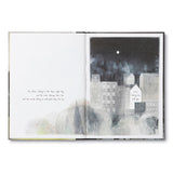 Compendium You Belong Here book open to an illustrated city at night page