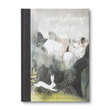 Compendium You Belong Here children's book, front cover with a deer and rabbit in a night forest