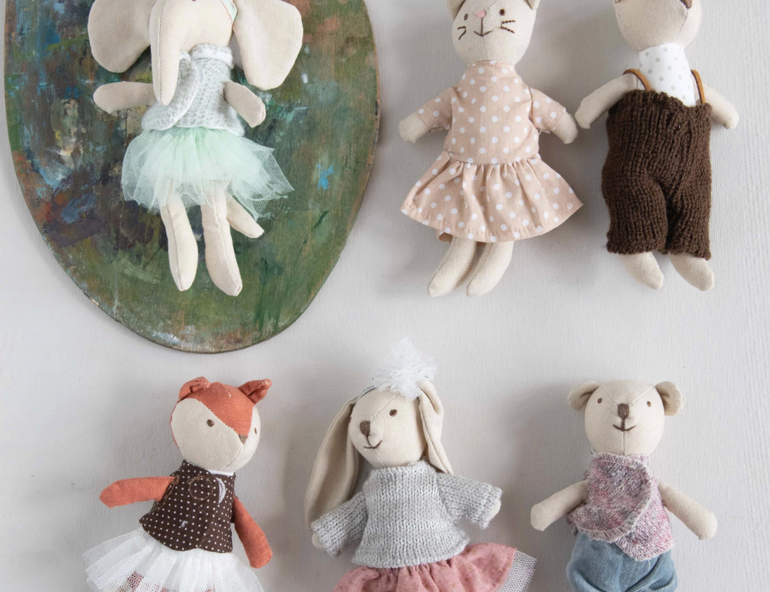 Creative Co-Op Cotton Linen Mini Animal Plush toys including an elephant, cats, fox, bunny and bear in little outfits