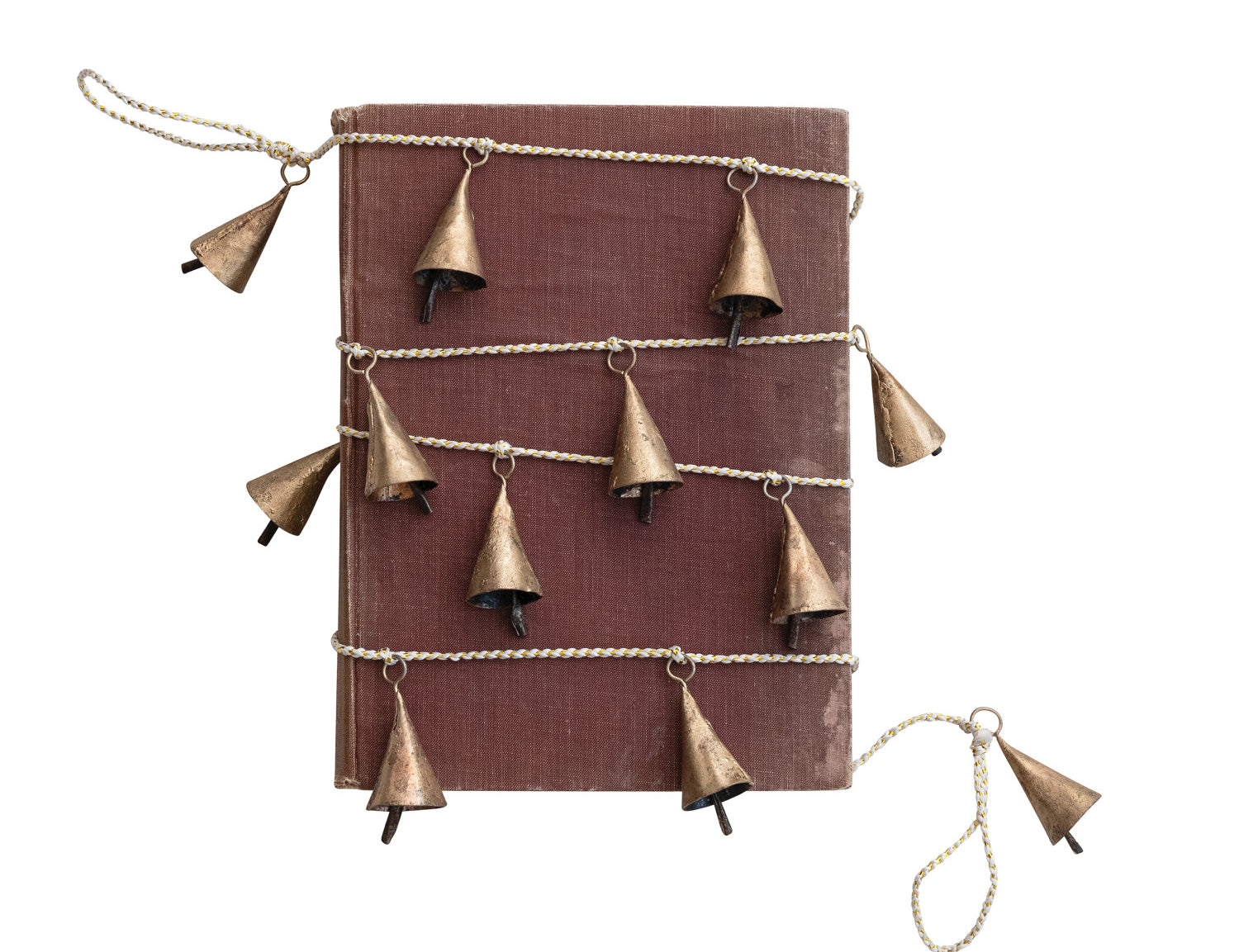 Metal bell garland in a gold finish on a white and gold cord