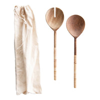 Creative Co-Op Salad Servers with Wrapped Handles, two wooden servers with rattan-wrapped handles and a linen bag