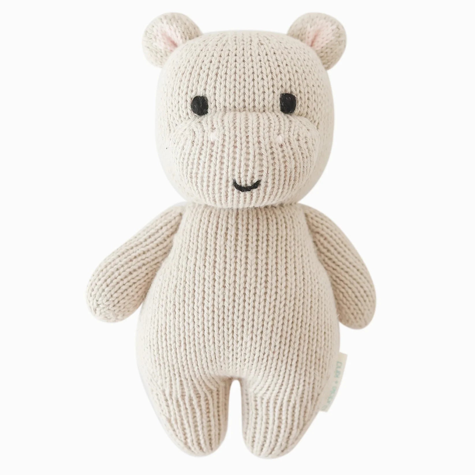 Cuddle & Kind Baby Hippo, cream hand-knit cotton hippo doll with pink ears, front view