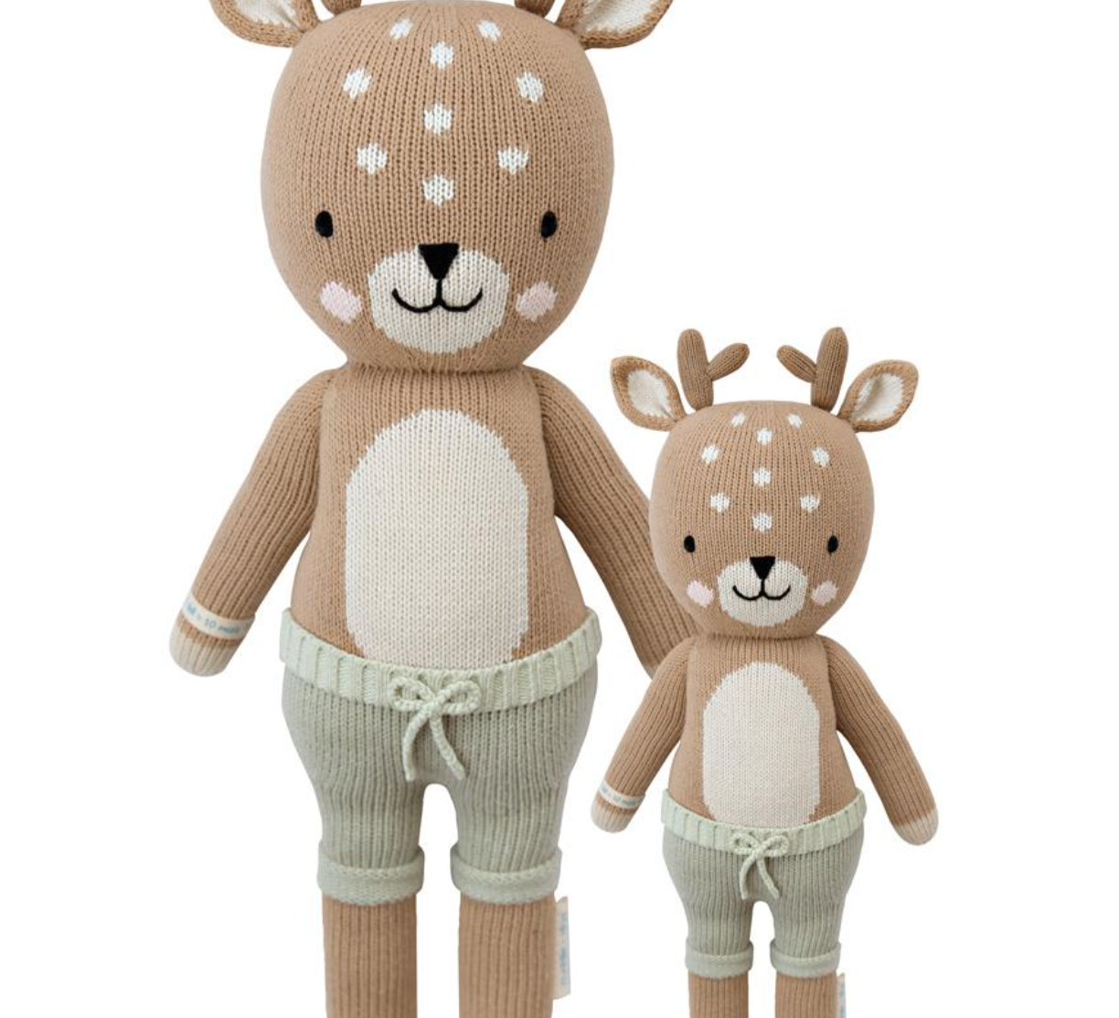 Cuddle + Kind Elliott the Fawn, a hand-knit tan fawn doll in mint shorts, shown in regular and little sizes