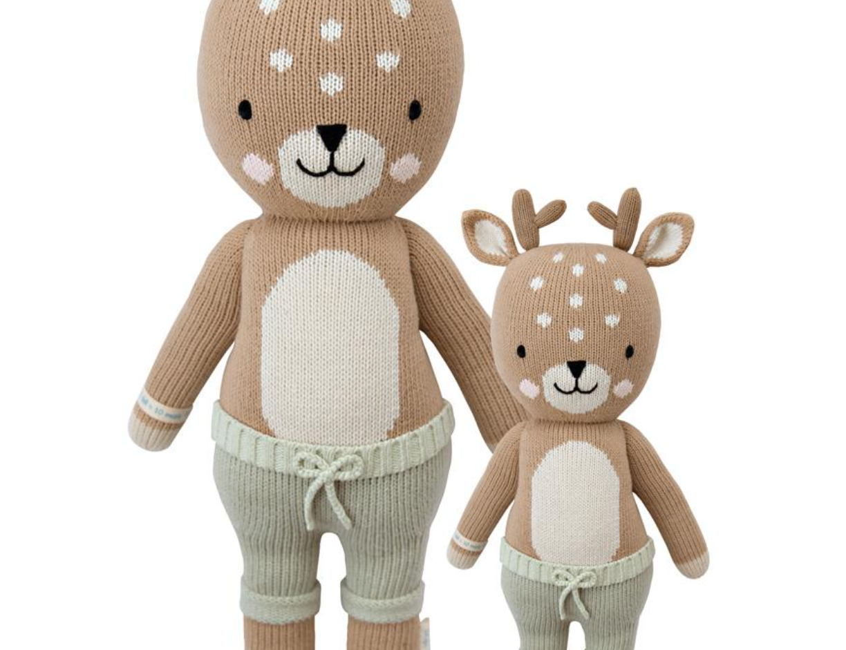 Cuddle + Kind Elliott the Fawn, a hand-knit tan fawn doll in mint shorts, shown in regular and little sizes