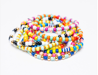 Daily Candy Bracelets, a stack of colorful multicolor seed bead stretch bracelets