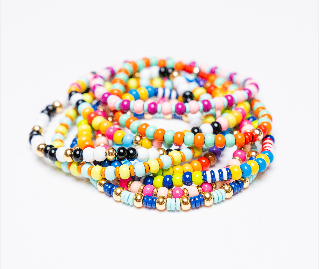 Daily Candy Bracelets, a stack of colorful multicolor seed bead stretch bracelets