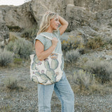 Model with the Desert Sol Carryall Tote in Cactus Bloom over her shoulder