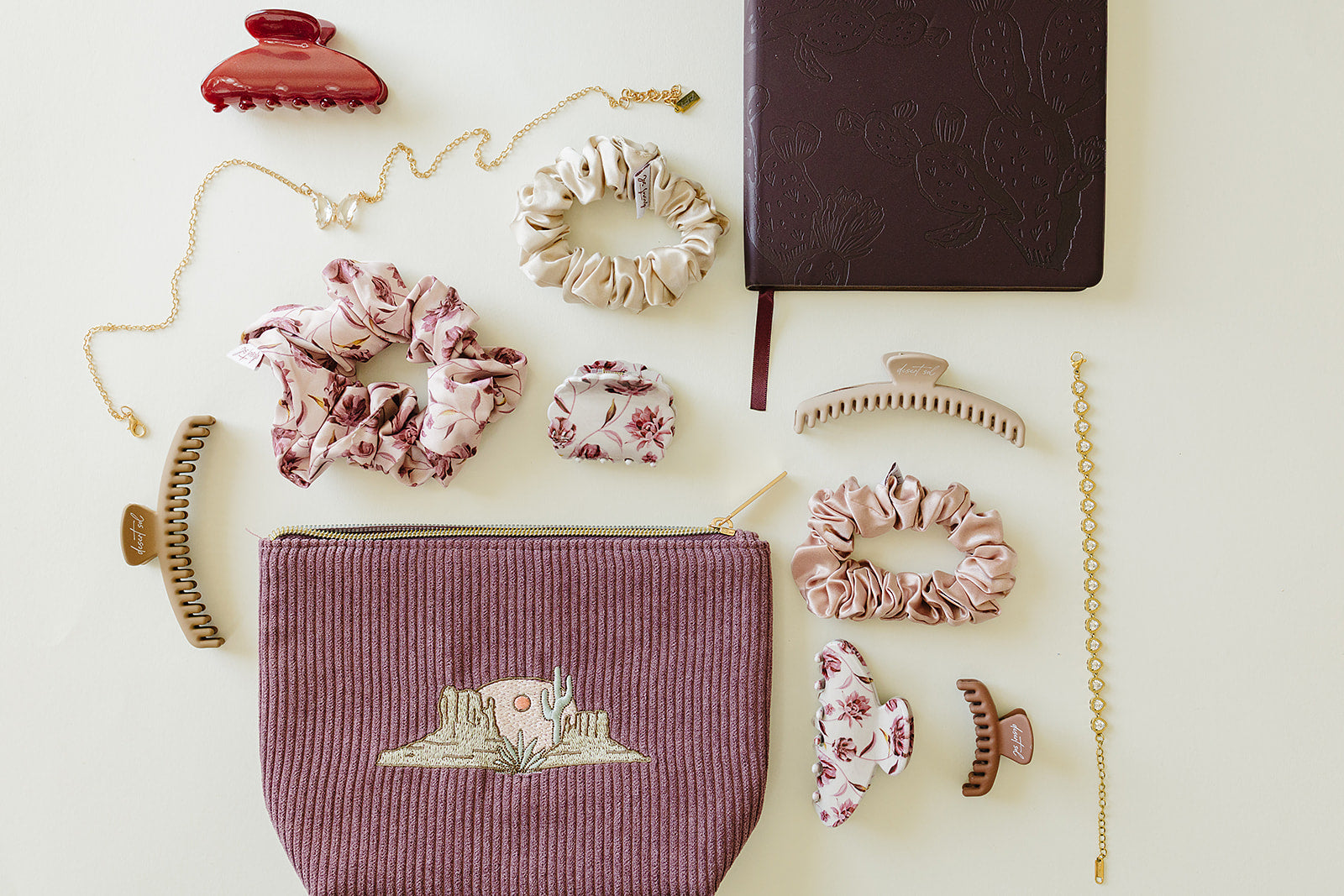 Desert Sol Desert Mesa corduroy pouch with the Desert Plum vegan leather journal, Mulberry Floral clips and gold jewelry