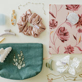 Desert Sol Mono Cactus corduroy pouch with a Mulberry Floral notebook, silk scrunchies, claw clips and jewelry