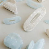 Desert Sol Moonstone blue and Pearl white acrylic claw clips and snap clips together