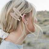 Desert Sol 2 Pack Hair Clips in Rose Dust worn with an ivory silk scrunchie