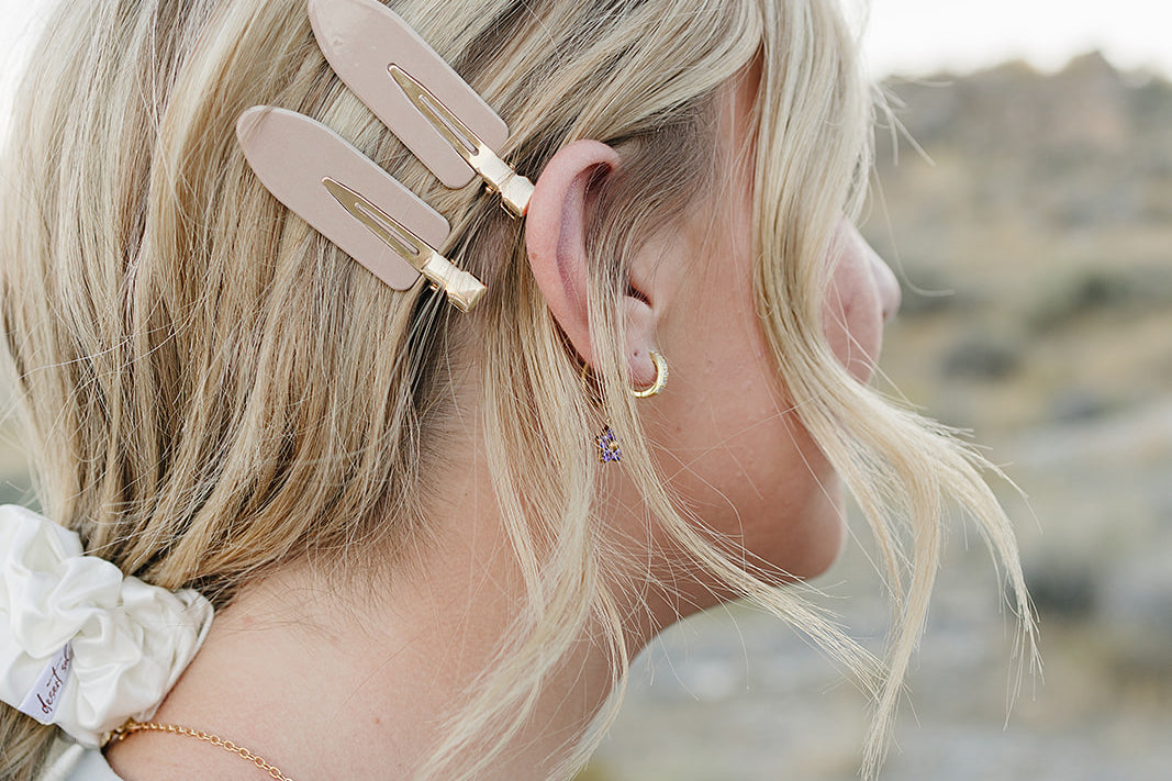 Desert Sol 2 Pack Hair Clips in Rose Dust worn with an ivory silk scrunchie
