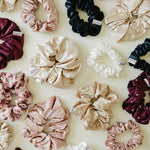 Desert Sol silk and satin scrunchies in plum, black, champagne, ivory and floral prints