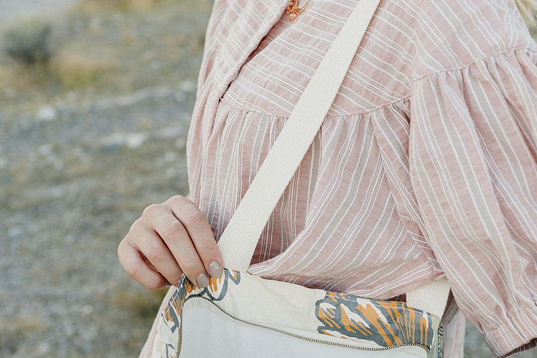 Inside the Desert Sol Utility Tote in Cactus Bloom, showing the interior pocket and snap closure