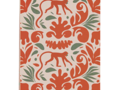 A Dopo Monkey Twin Wire Notepad, a cream notepad with terracotta monkeys among green foliage, a gold and green checkered header band and a gold twin wire spiral