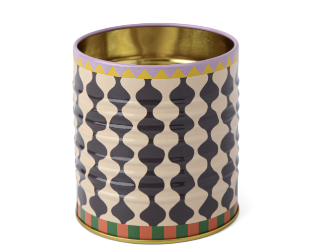 A Dopo Tin Black and White Wavy, a cylindrical tin pencil cup in a navy and cream wavy oval pattern with a striped rim and a gold interior