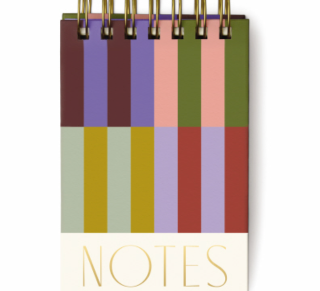 Bold Stripes Chunky Notepad, a wire bound notepad in vertical color blocks of plum, olive, sage, dusty rose and purple with NOTES in gold at the foot