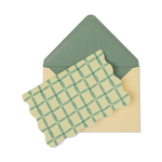 Designworks notecard with a green windowpane check pattern and a scalloped edge, with a green envelope