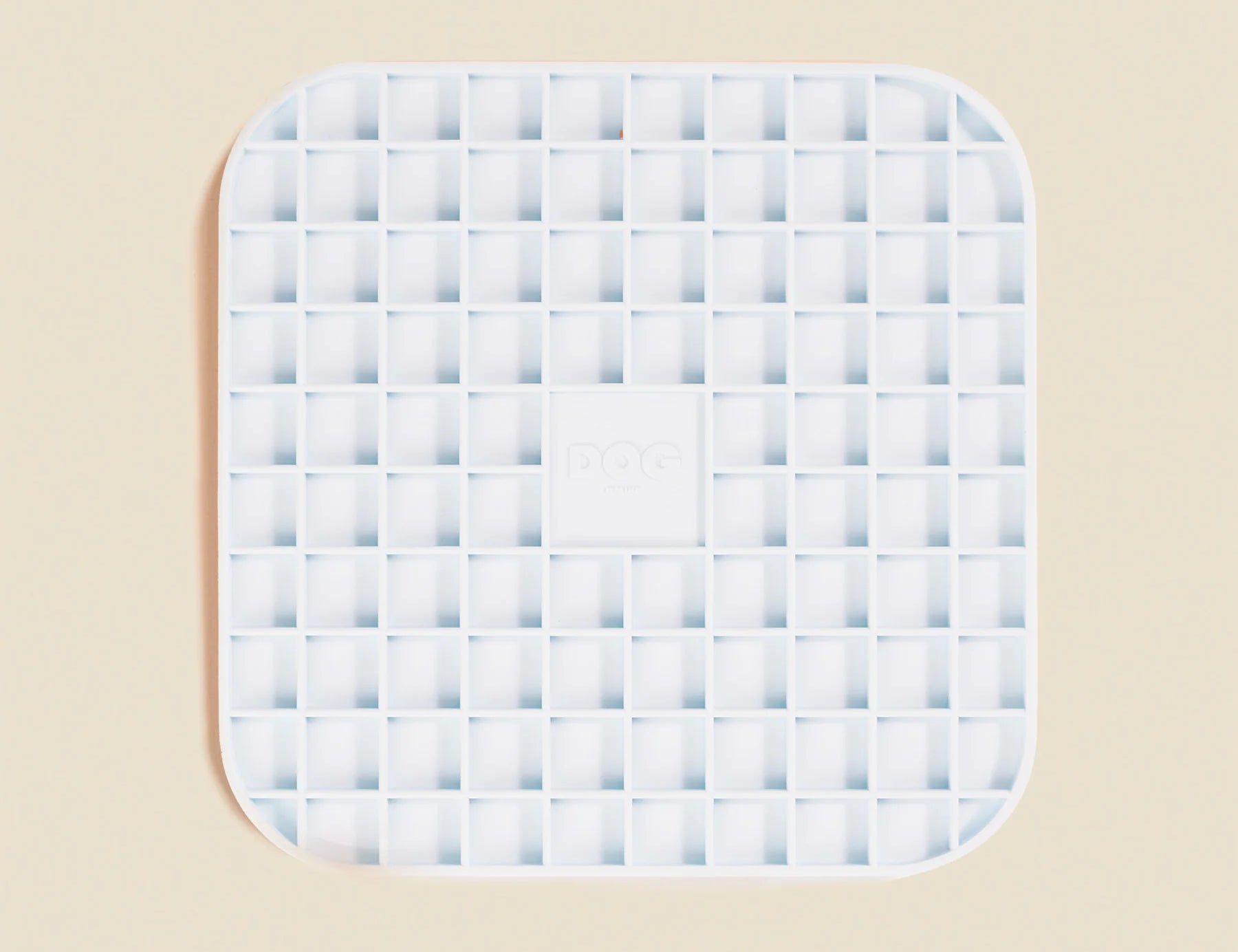 DOG by Dr Lisa DOG Lick Mat in Blue, a light blue silicone mat with a waffle grid texture