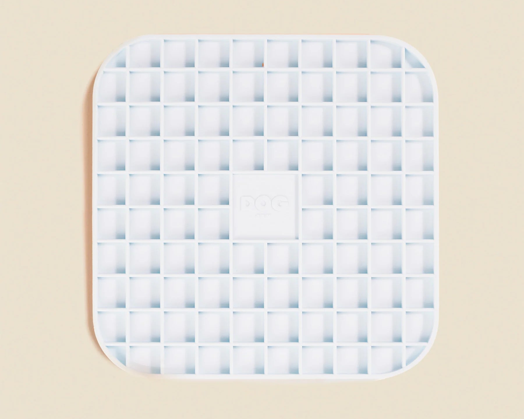 DOG by Dr Lisa DOG Lick Mat in Blue, a light blue silicone mat with a waffle grid texture