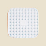 DOG by Dr Lisa DOG Lick Mat in Blue, a light blue silicone mat with a waffle grid texture