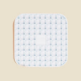 DOG by Dr Lisa DOG Lick Mat in Blue, a light blue silicone mat with a waffle grid texture