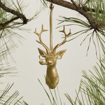E + E Ornaments, fifth view, the gold buck hanging from a pine branch