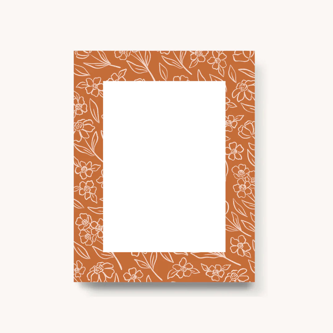 Elyse Breanne Terracotta Floral Notepad, a small white pad with a terracotta floral border on cream
