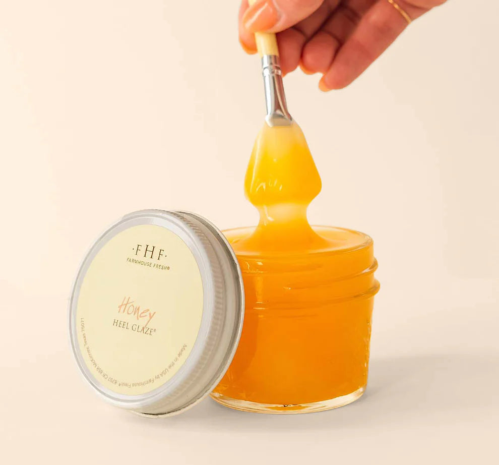 Farmhouse Fresh Honey Heel Glaze, a jar of golden honey glaze dripping from a brush