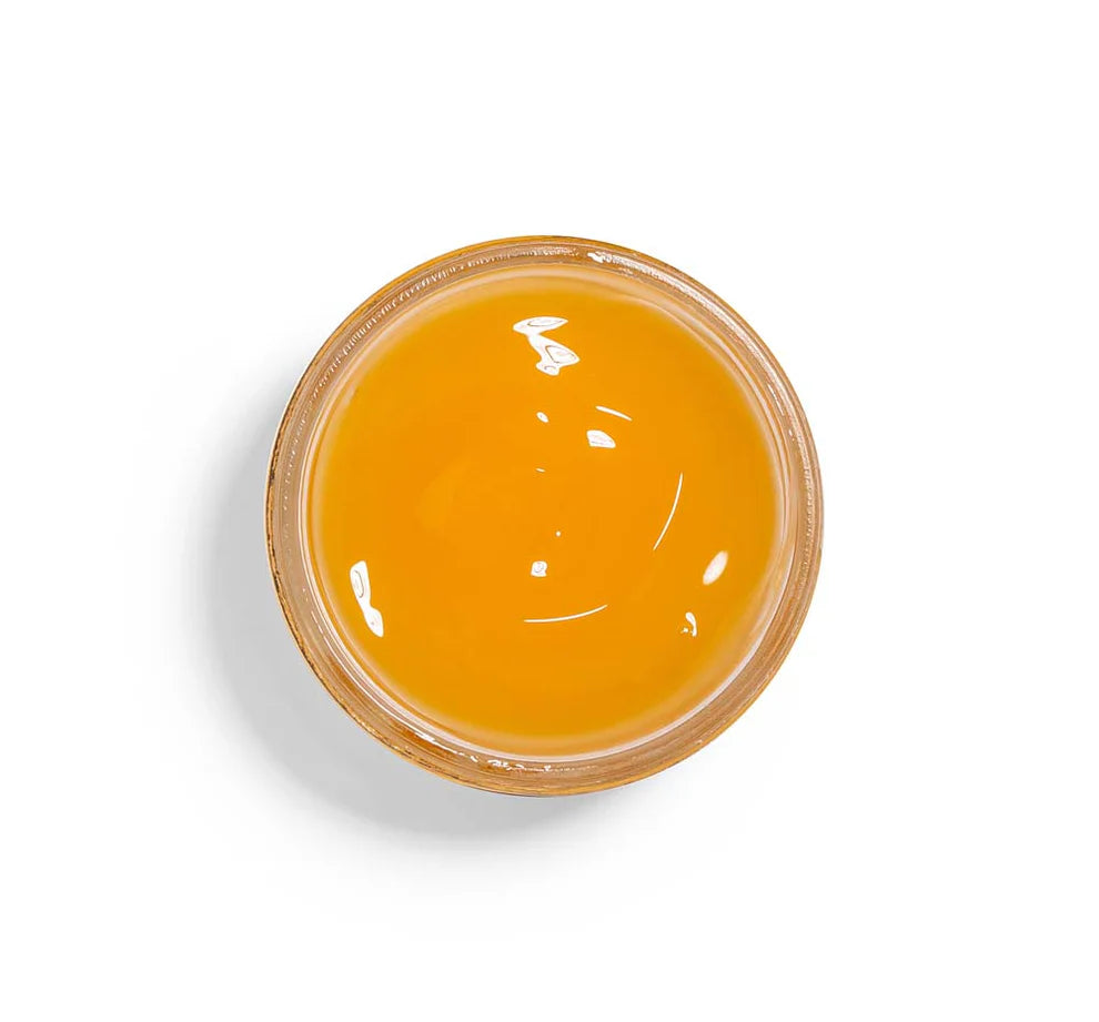 Farmhouse Fresh Honey Heel Glaze open jar from above showing the golden glaze