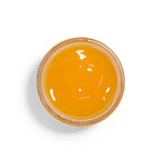 Farmhouse Fresh Honey Heel Glaze open jar from above showing the golden glaze